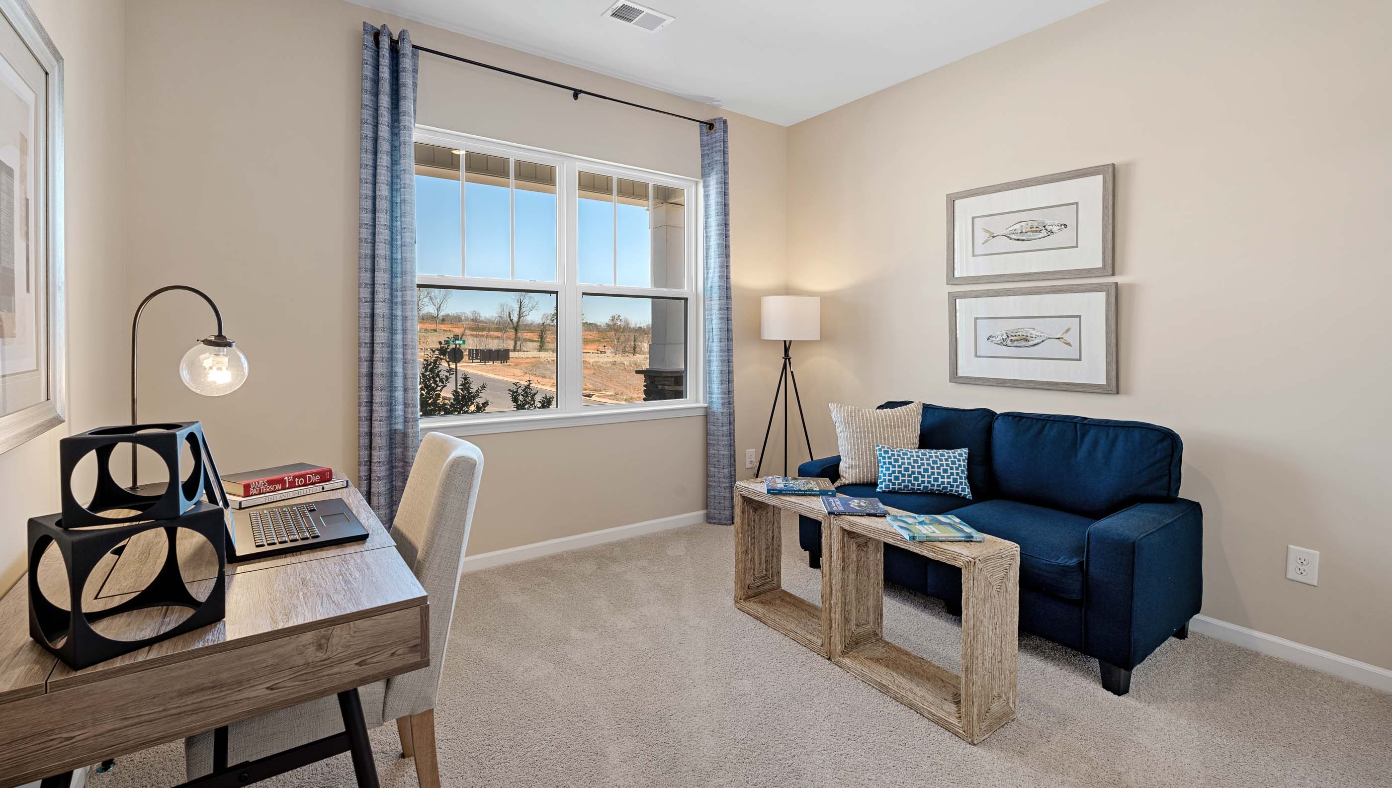 Bedroom with carpet and window.