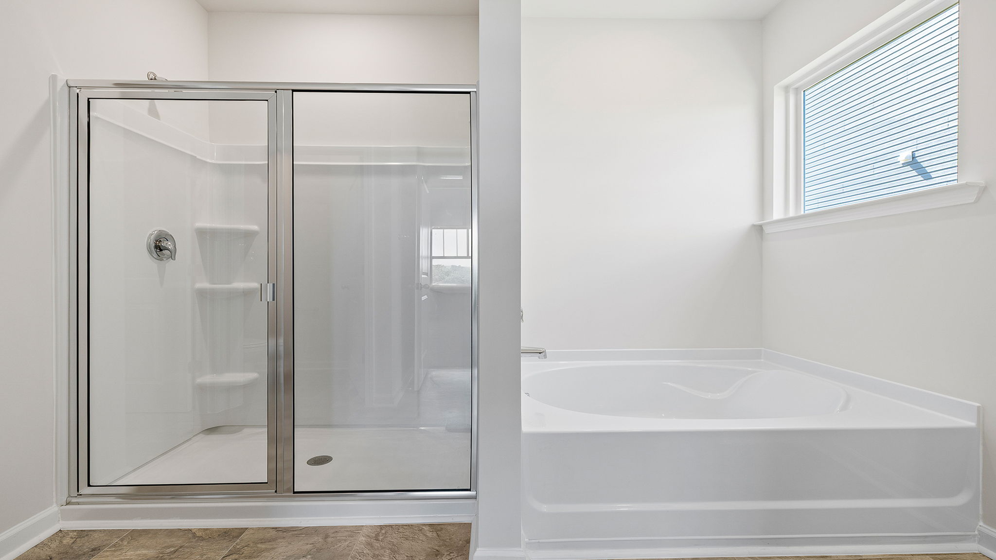 Primary bathroom with garden tub and shower.