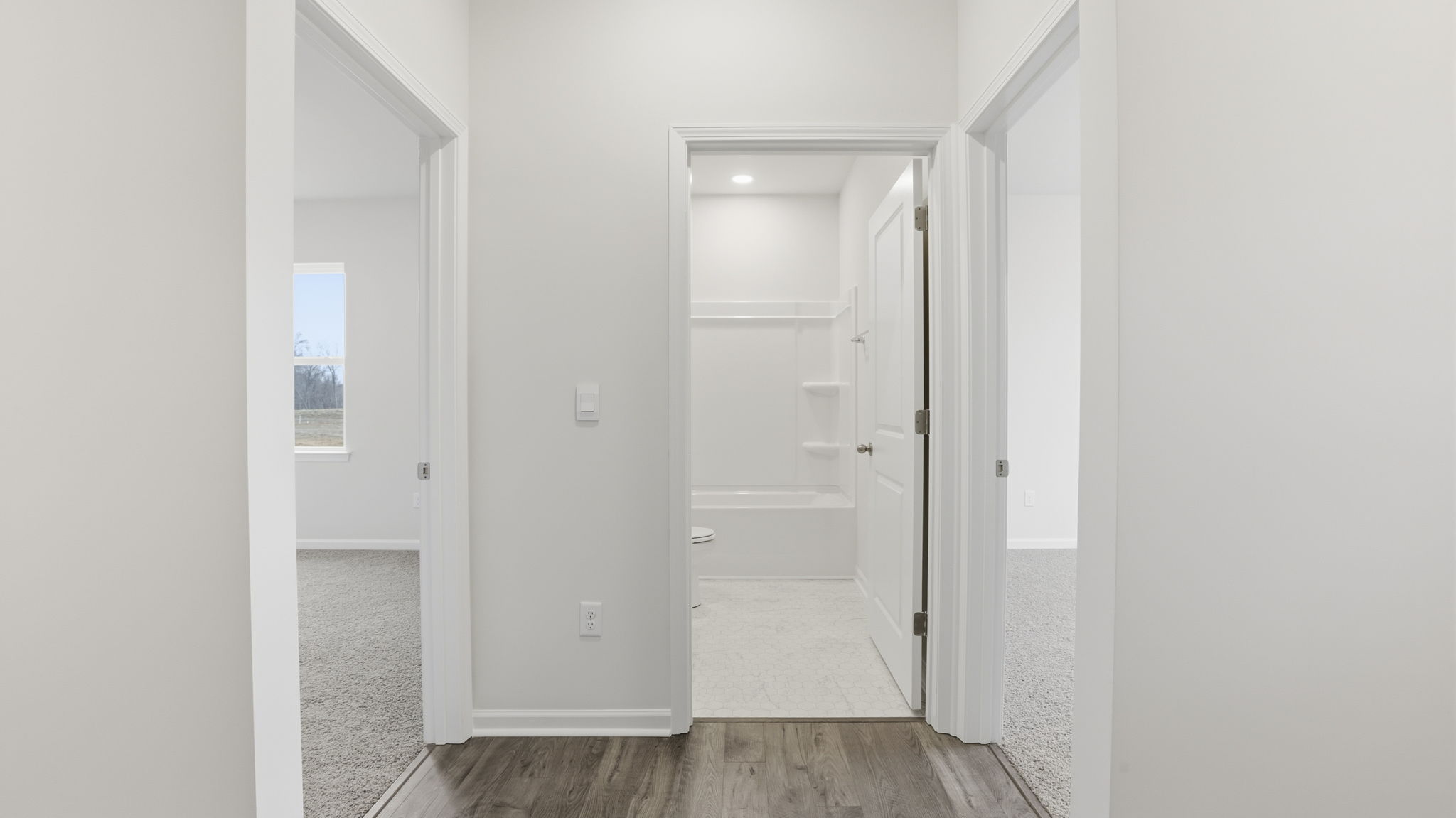 View of hallway toward the bedrooms and hall bath.