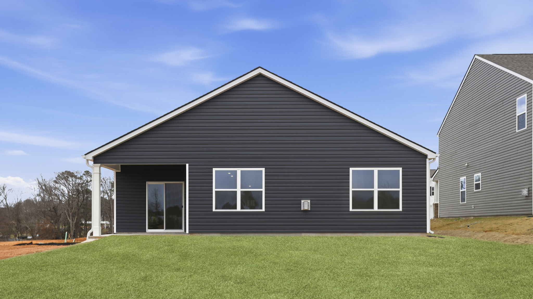 Back exterior view of the Cali with covered porch.