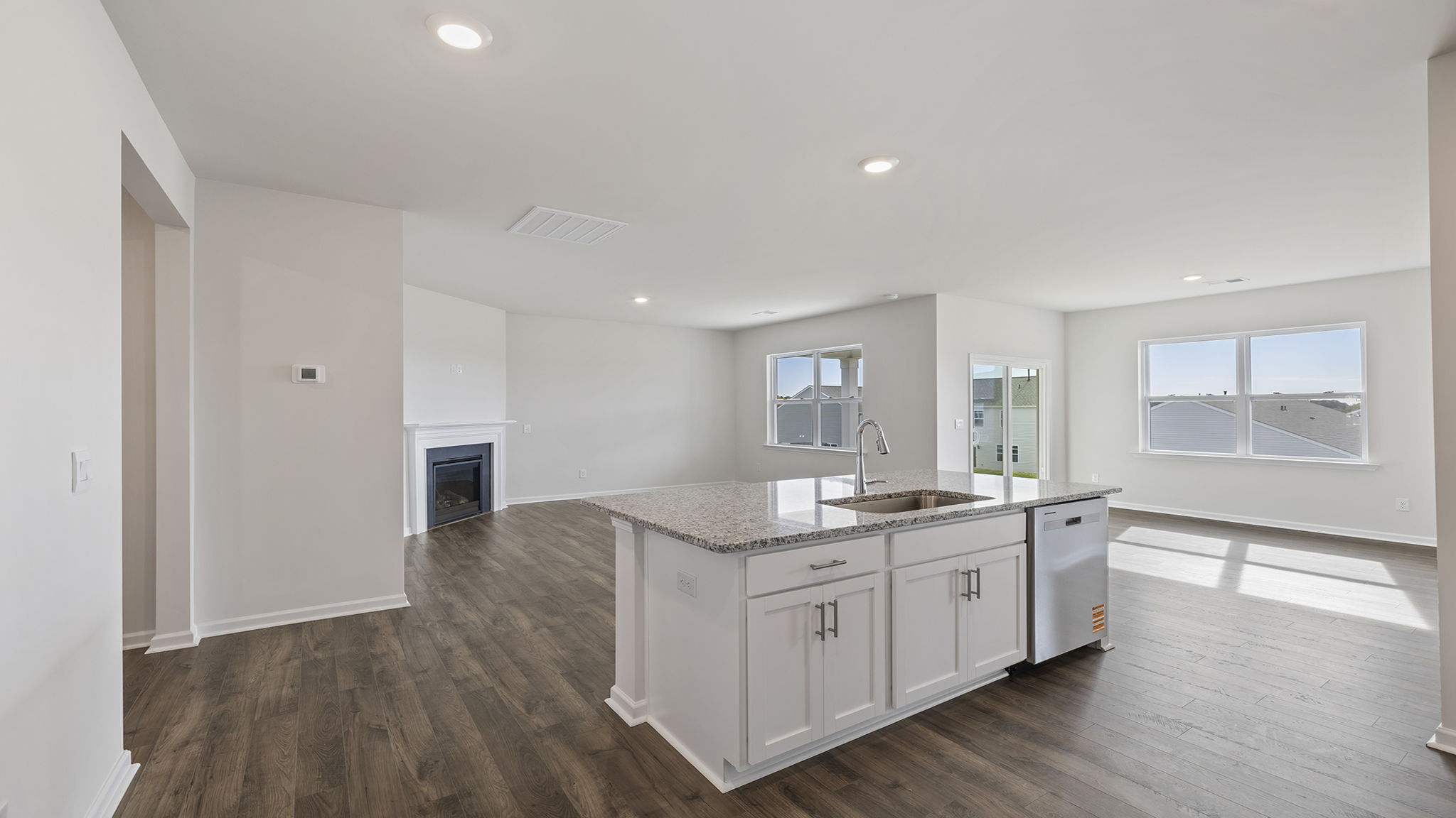 Kitchen with island and cabinets.
