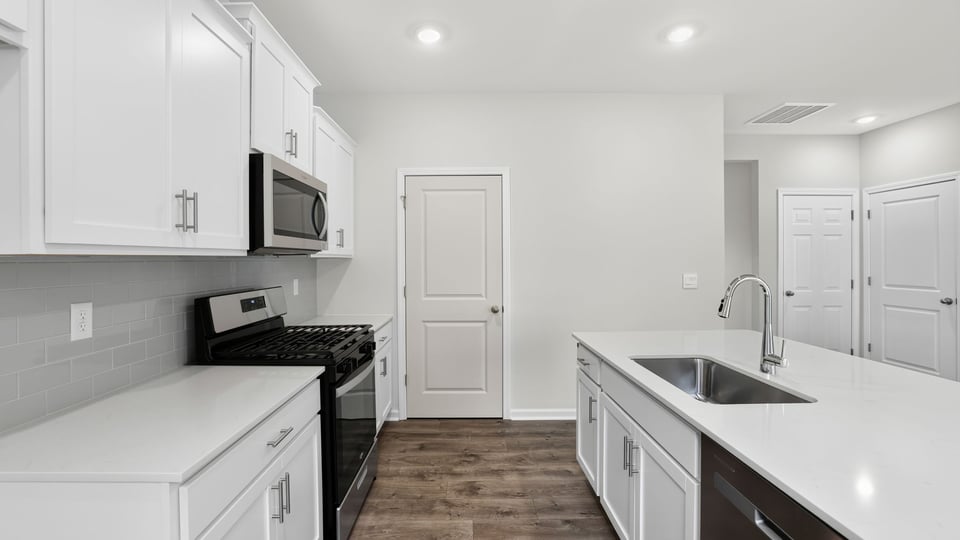 Side view full kitchen and pantry