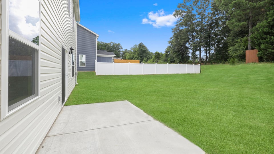 Back of the exterior with view of big yard