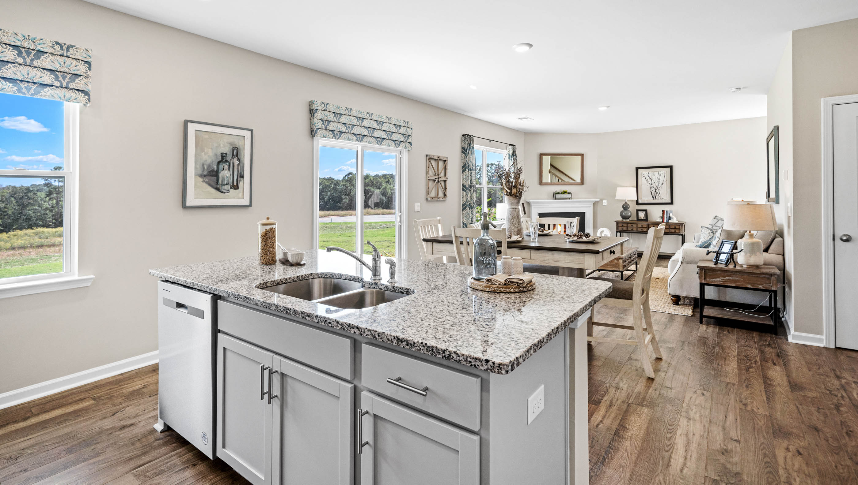 Kitchen with island and cabinets.