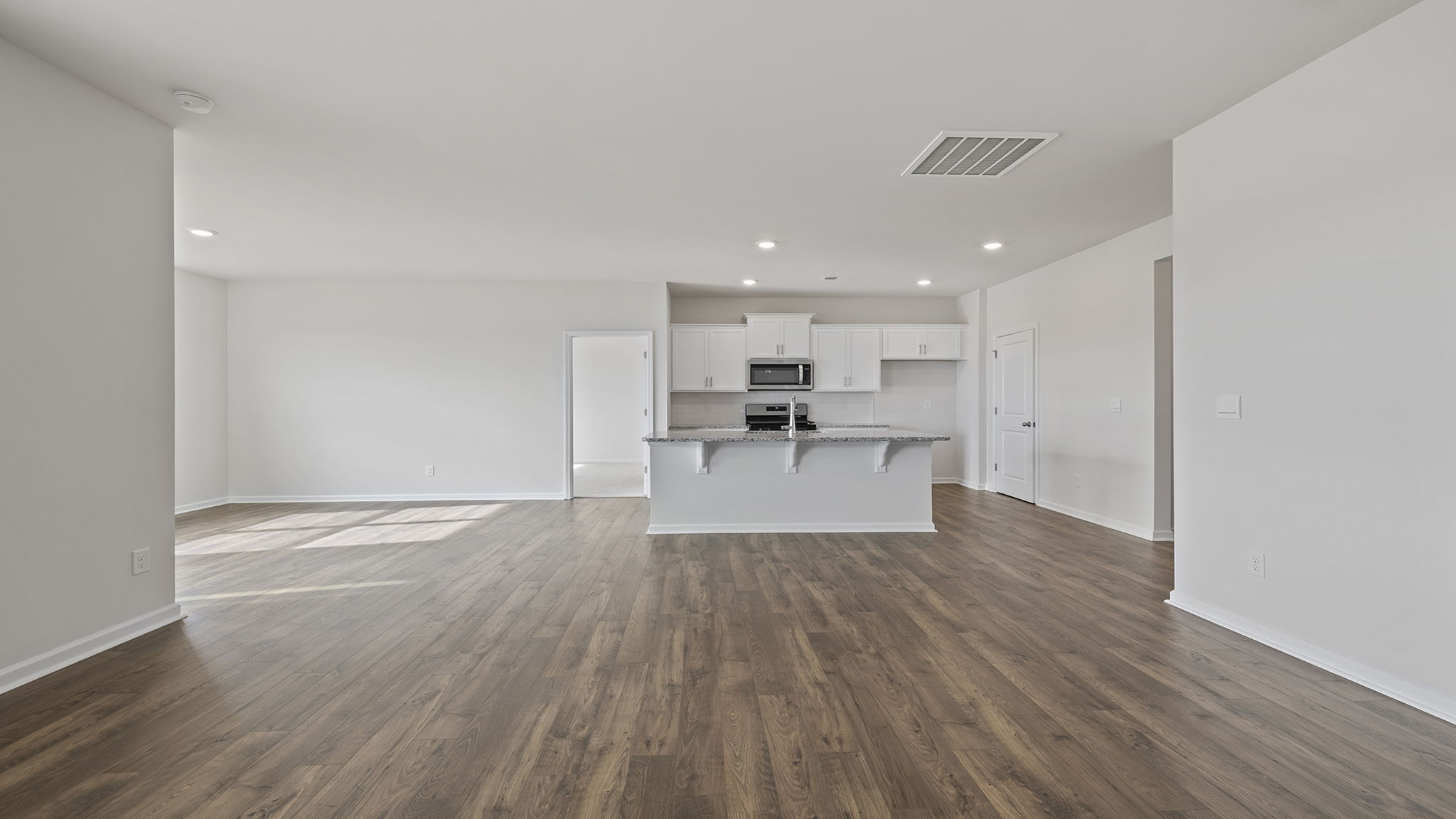 Living area with fireplace and window.