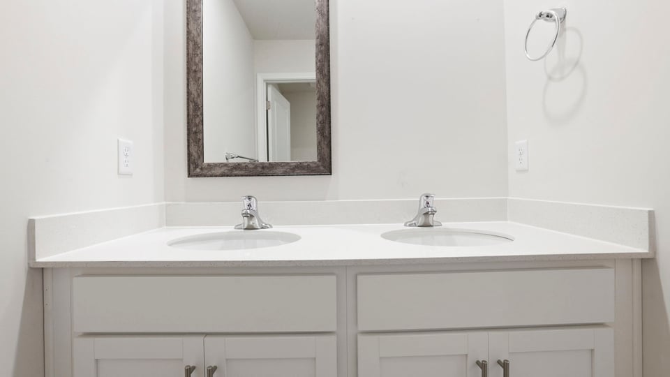 Bathroom with double vanity sink.