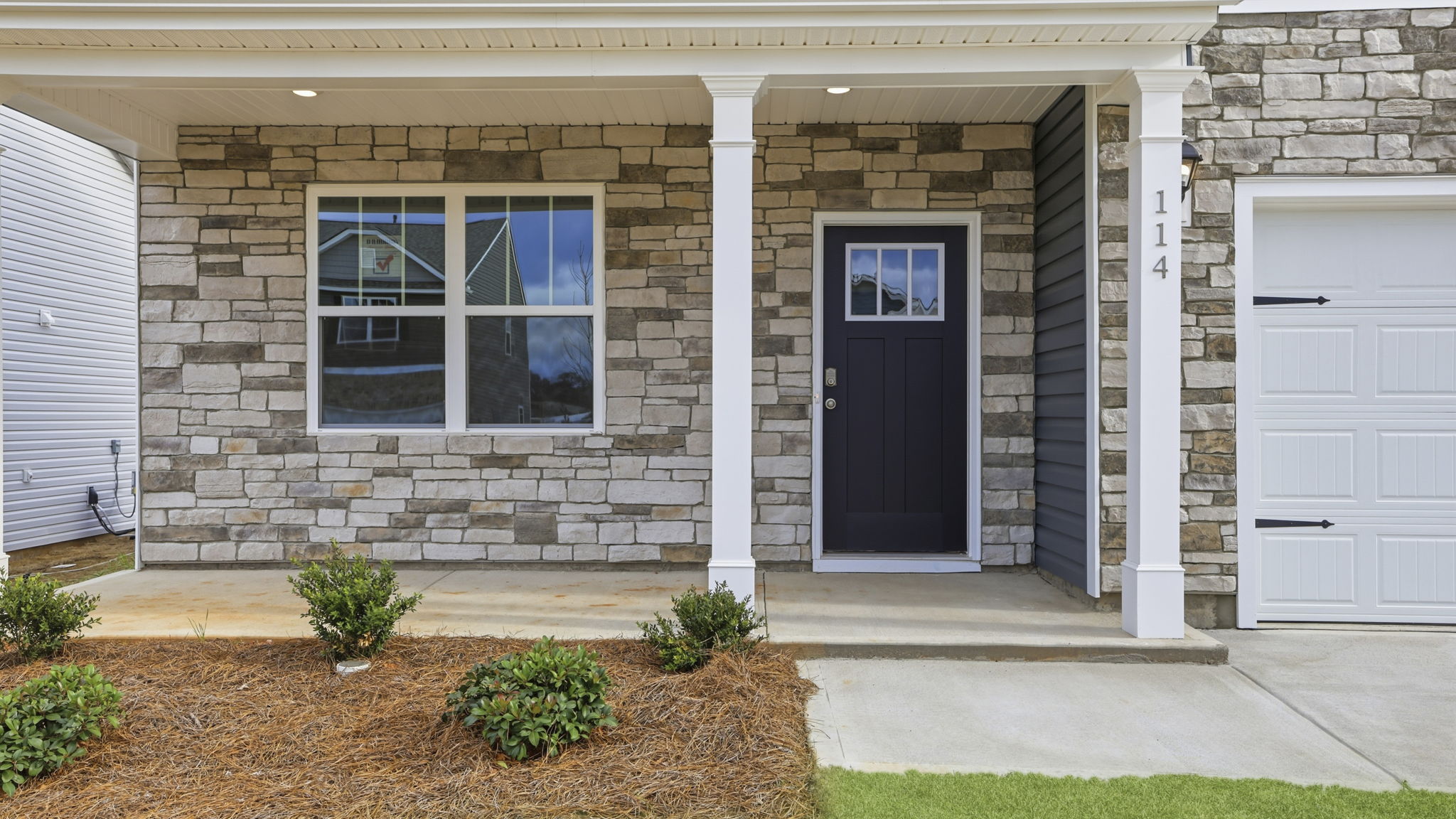 Inviting entry and front porch.