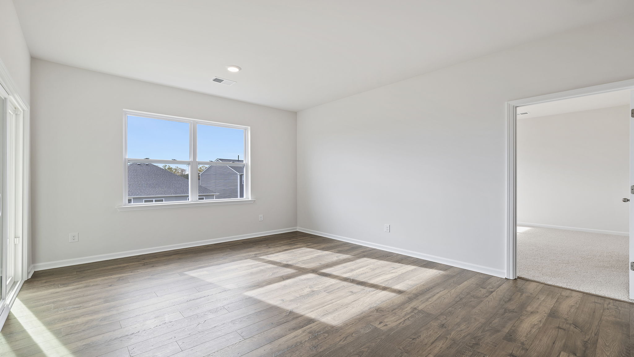Living area with fireplace and window.