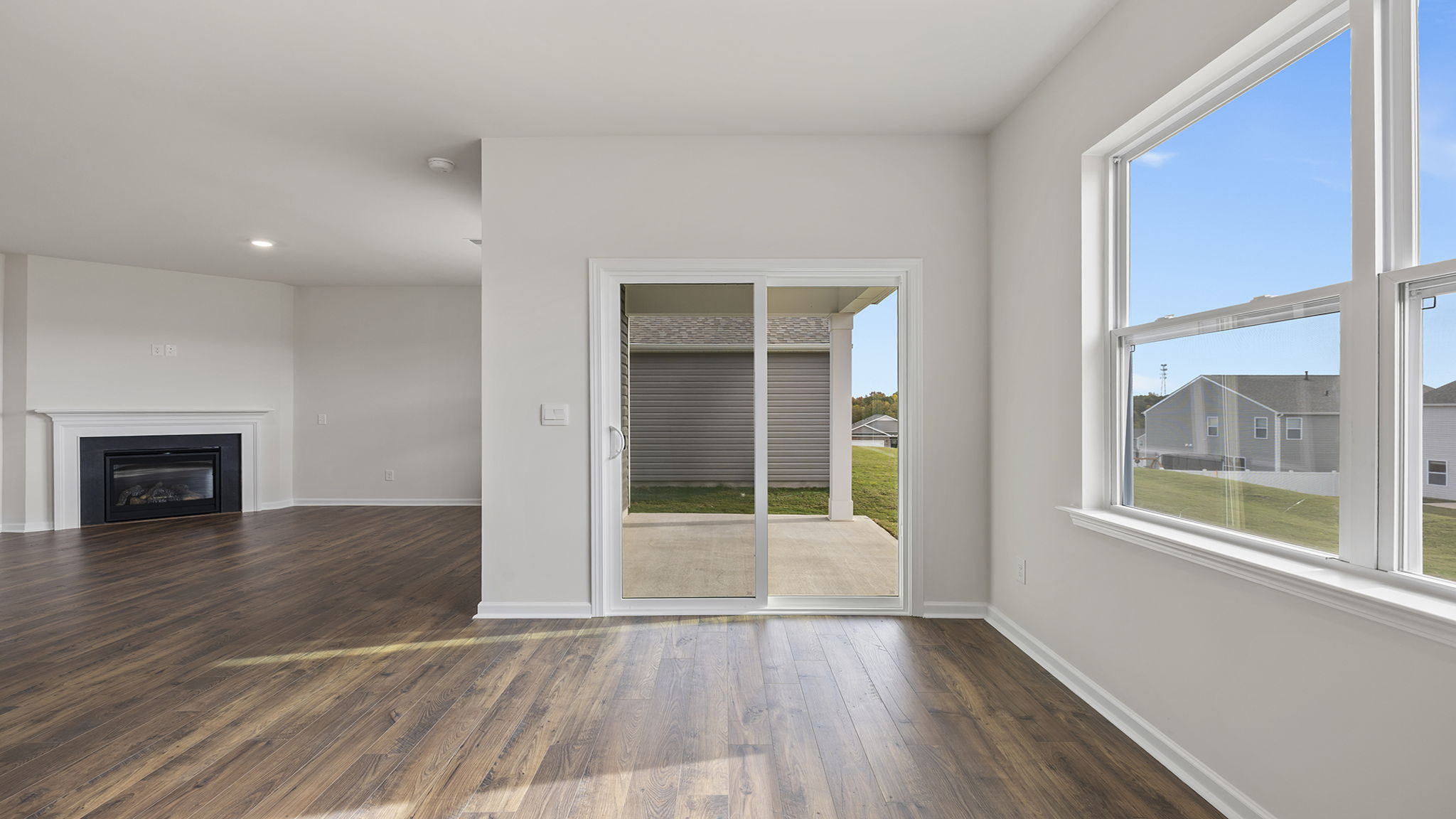 Living area with fireplace and window.