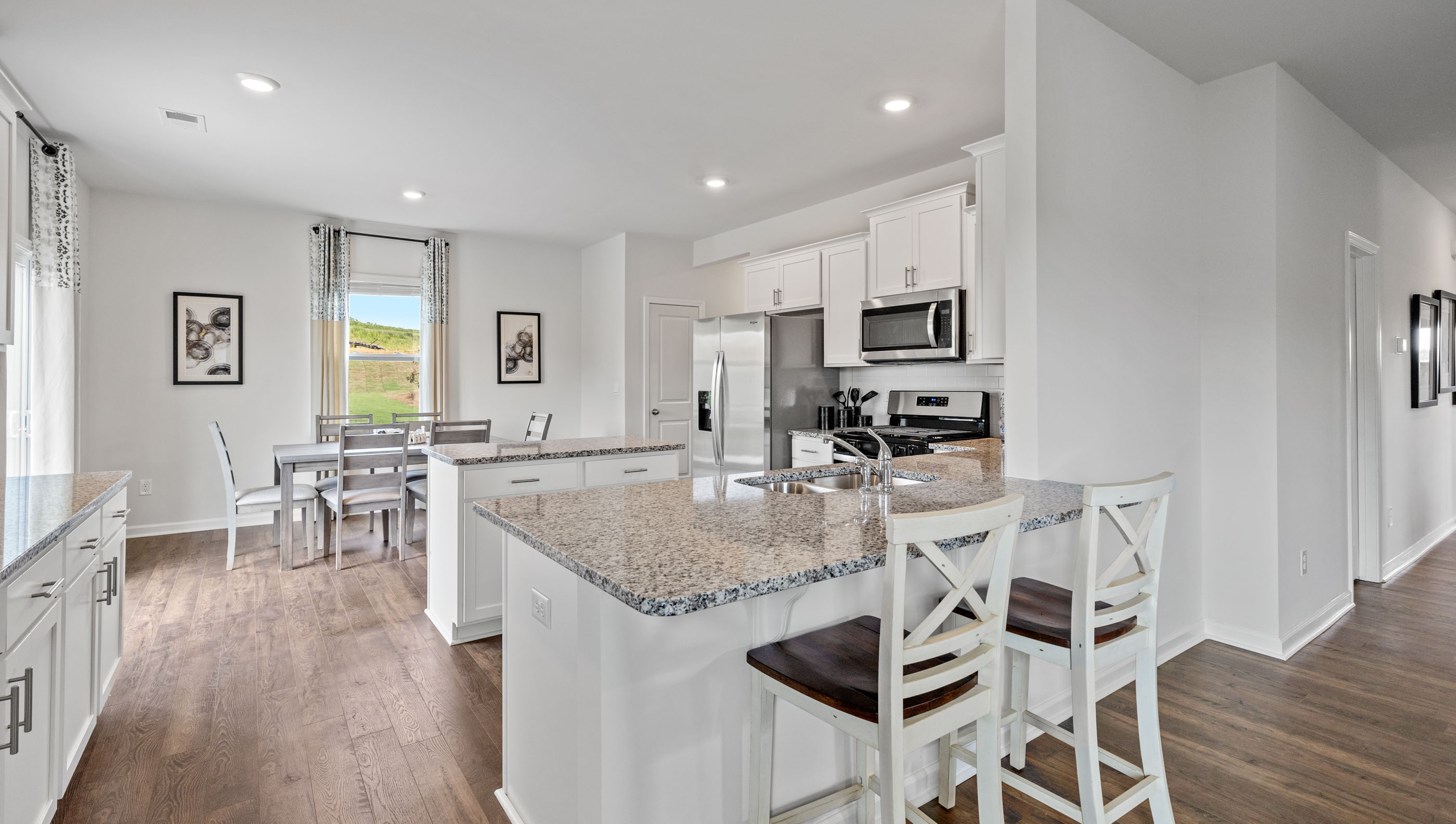 Kitchen with island and cabinets.