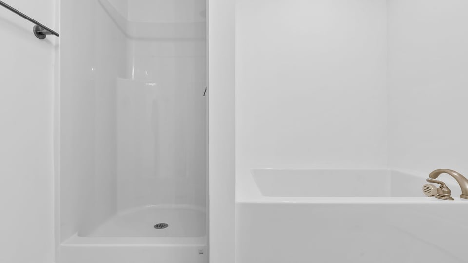 Primary bathroom with double vanity sink.