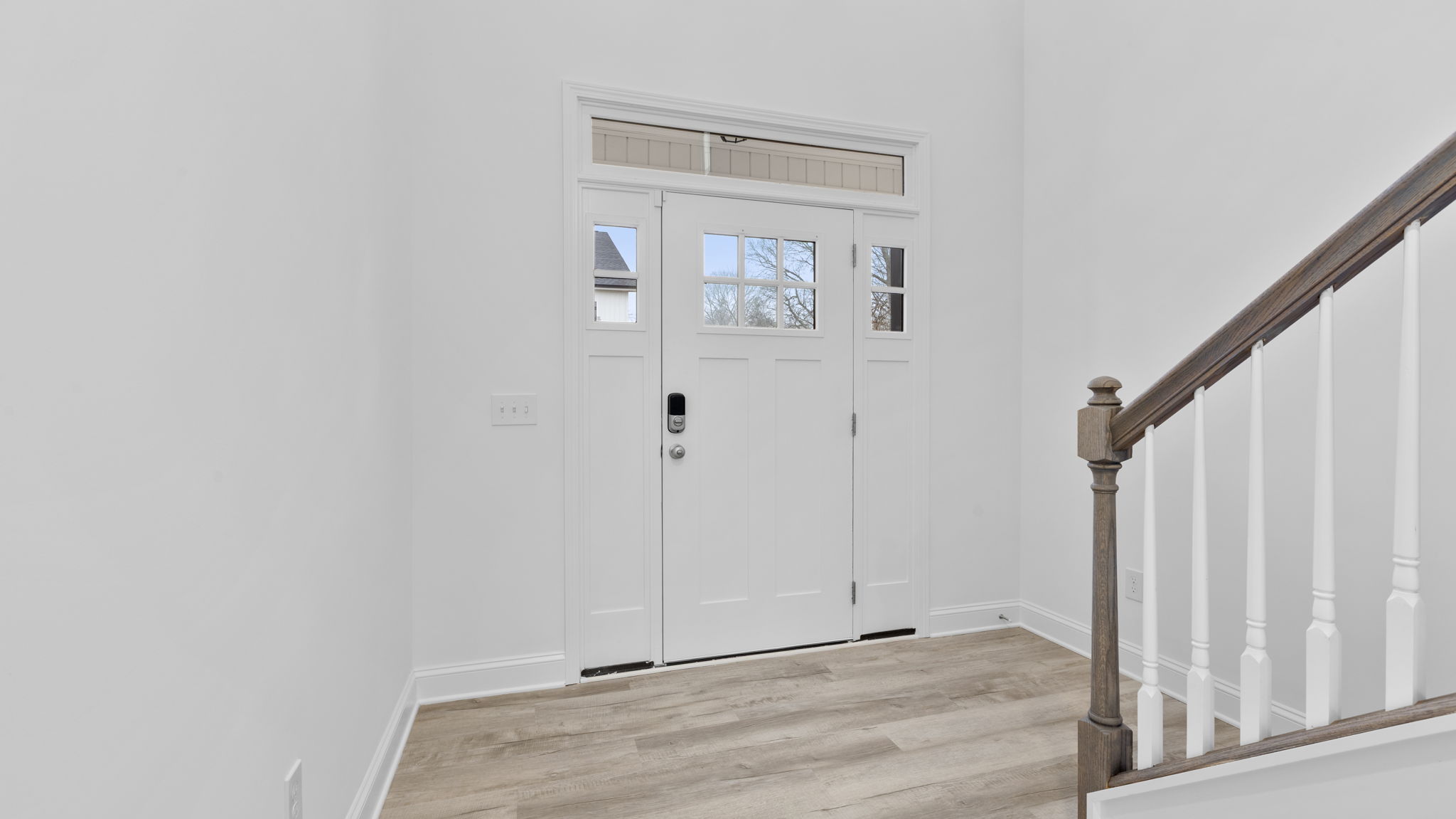 View of entrance and stairwell.