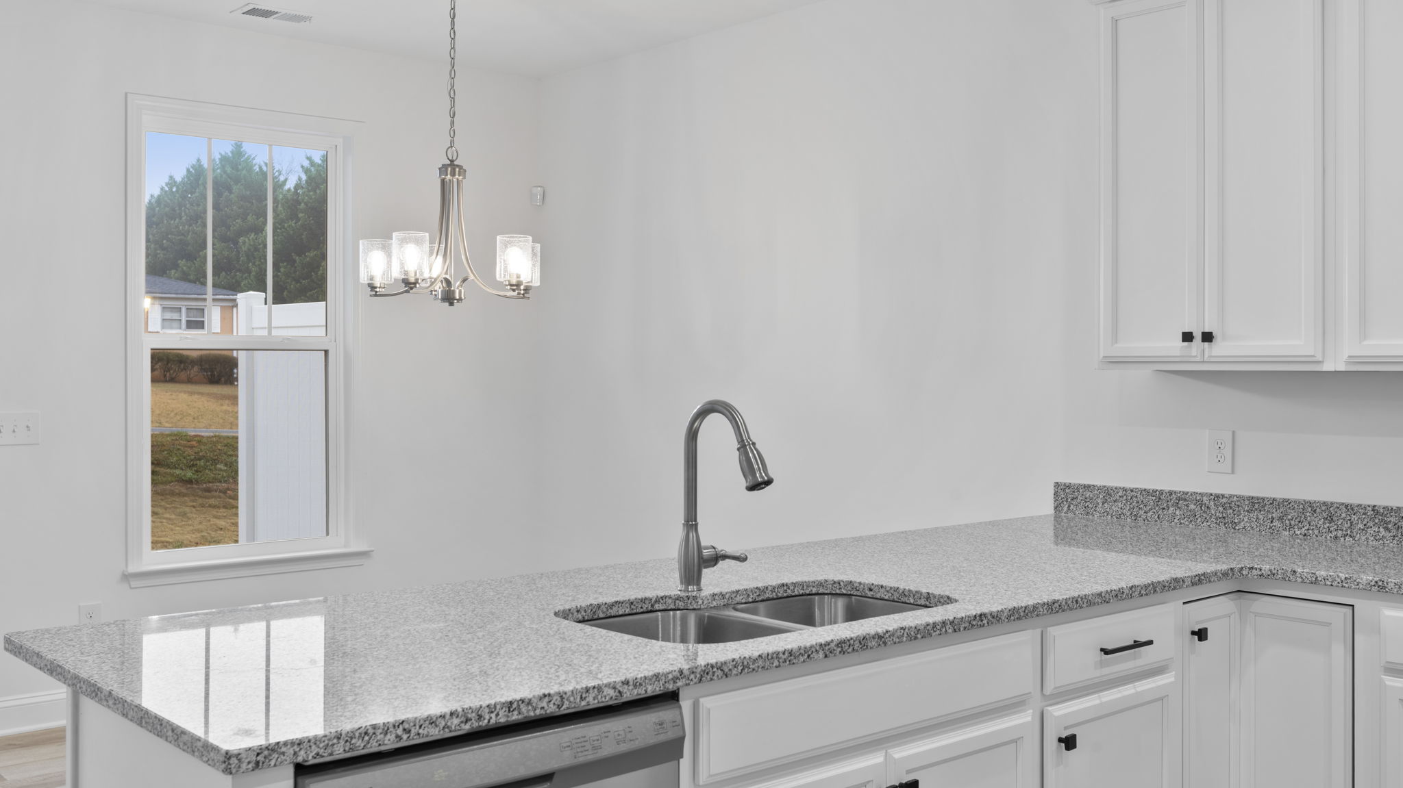 View from sink into dining area.