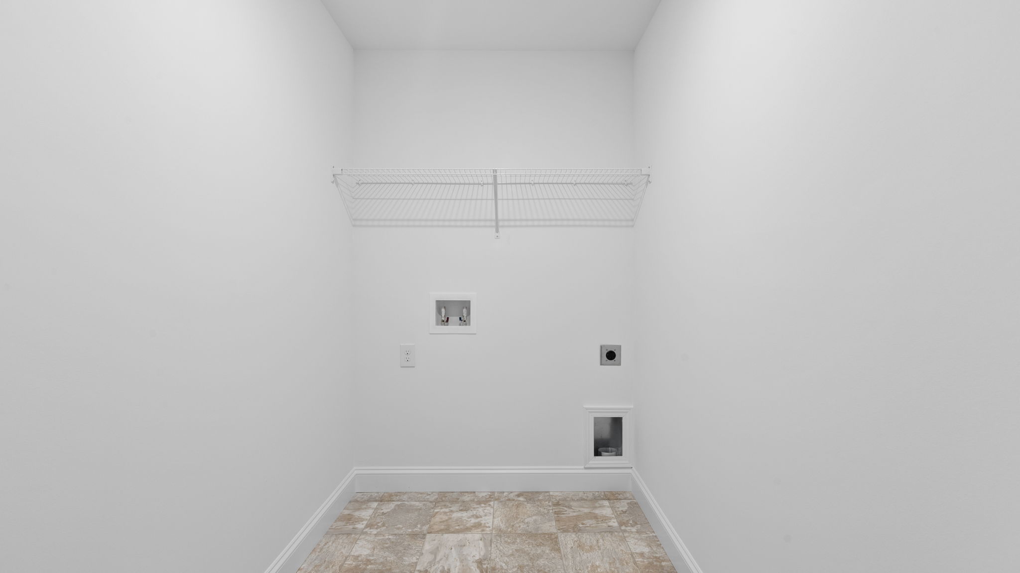 Walk-in laundry room.