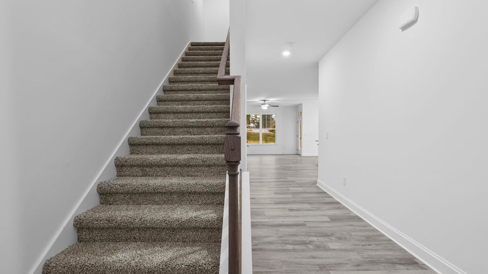 View from foyer of hallway and staircase.