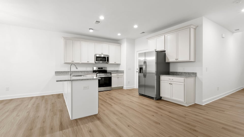 View of kitchen with island.