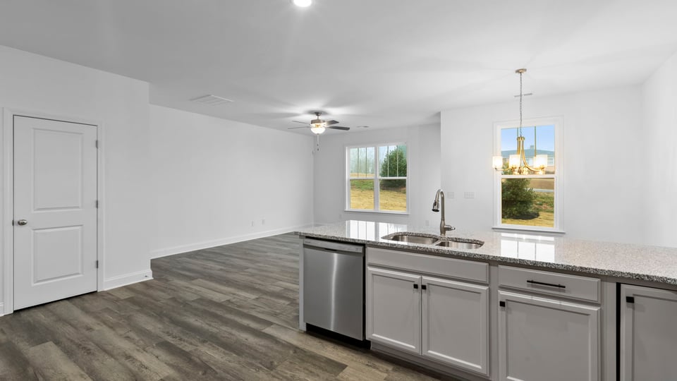 View of island overlooking the living and dining area.