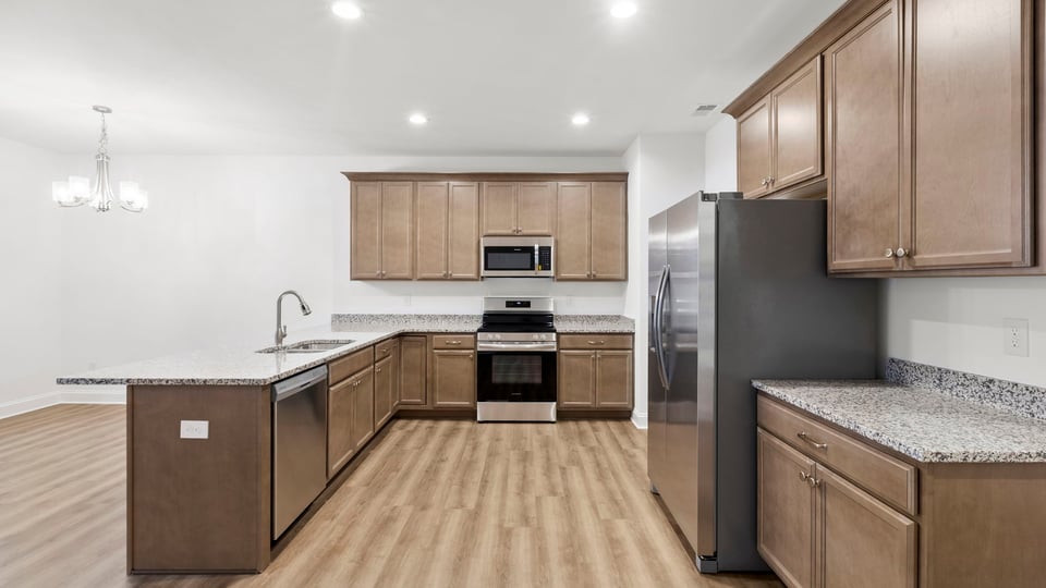 View of kitchen with island.