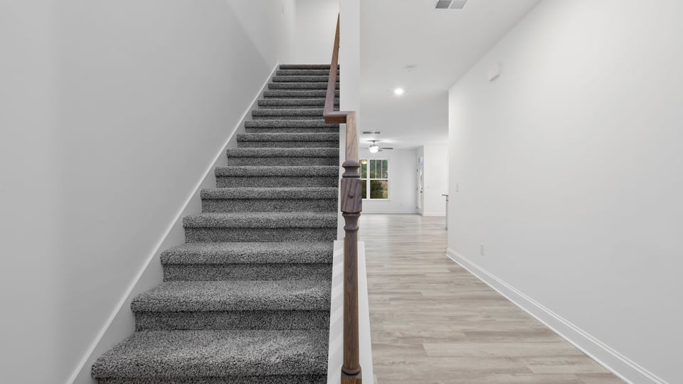 View from foyer of hallway and staircase.