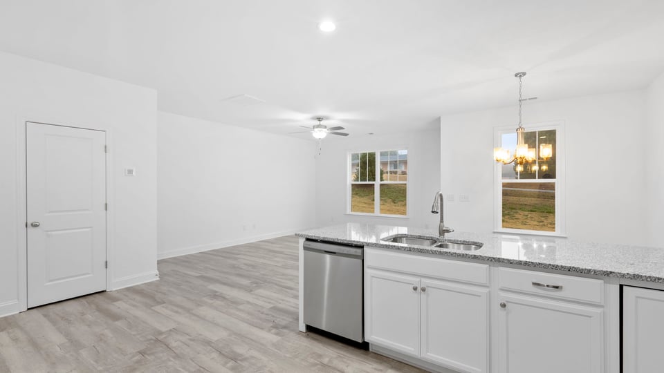 View of island overlooking the living and dining area.