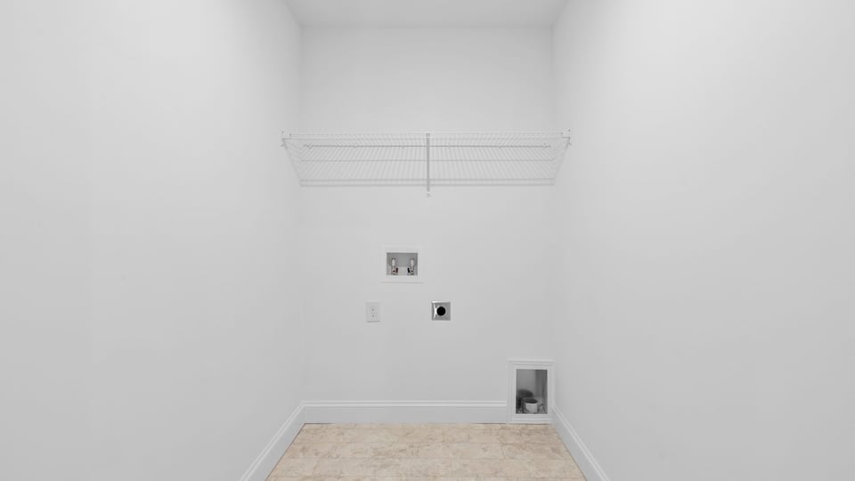 Walk-in laundry room.