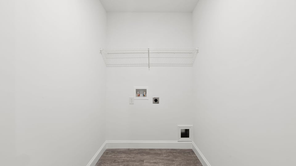 Laundry room with shelf.