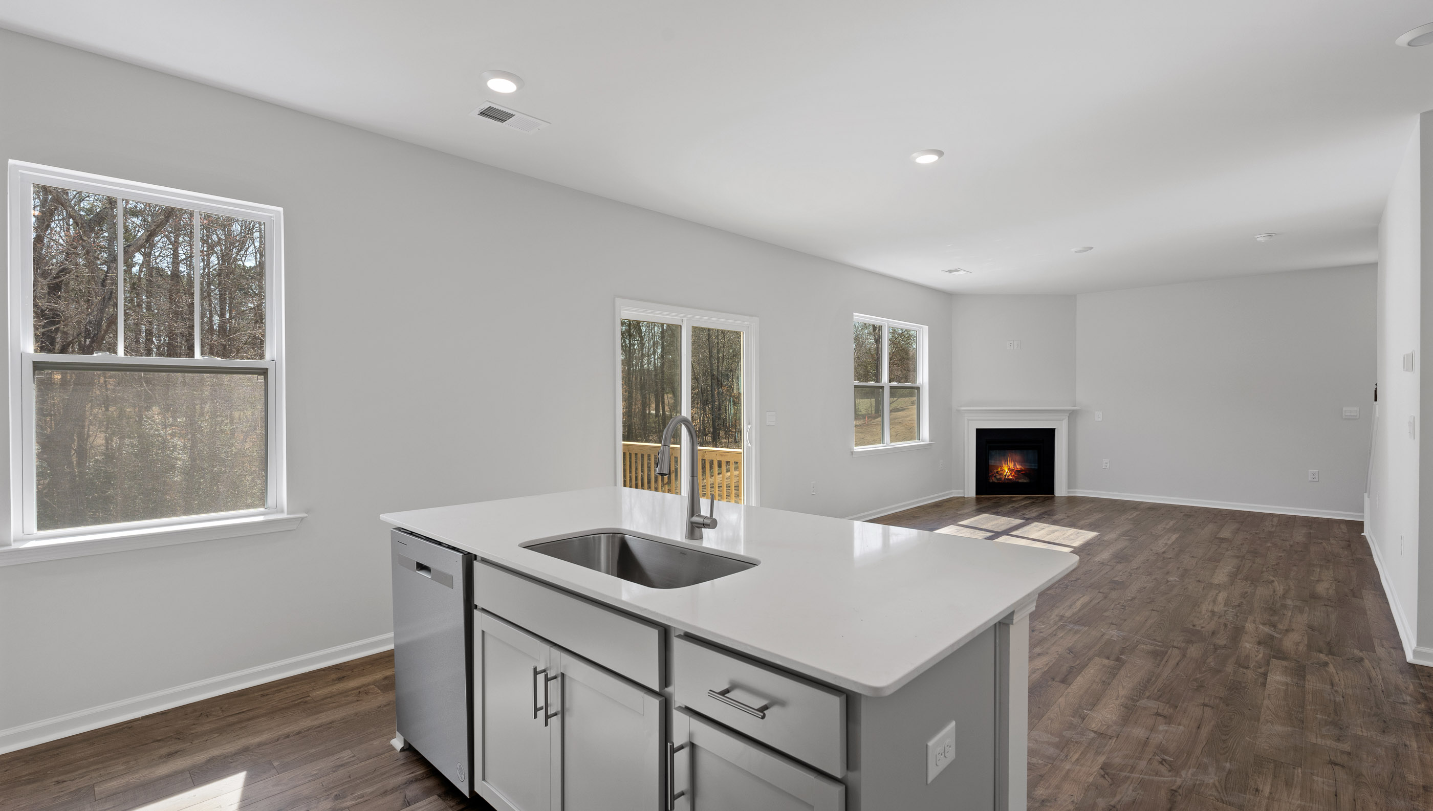 Kitchen with island and cabinets.