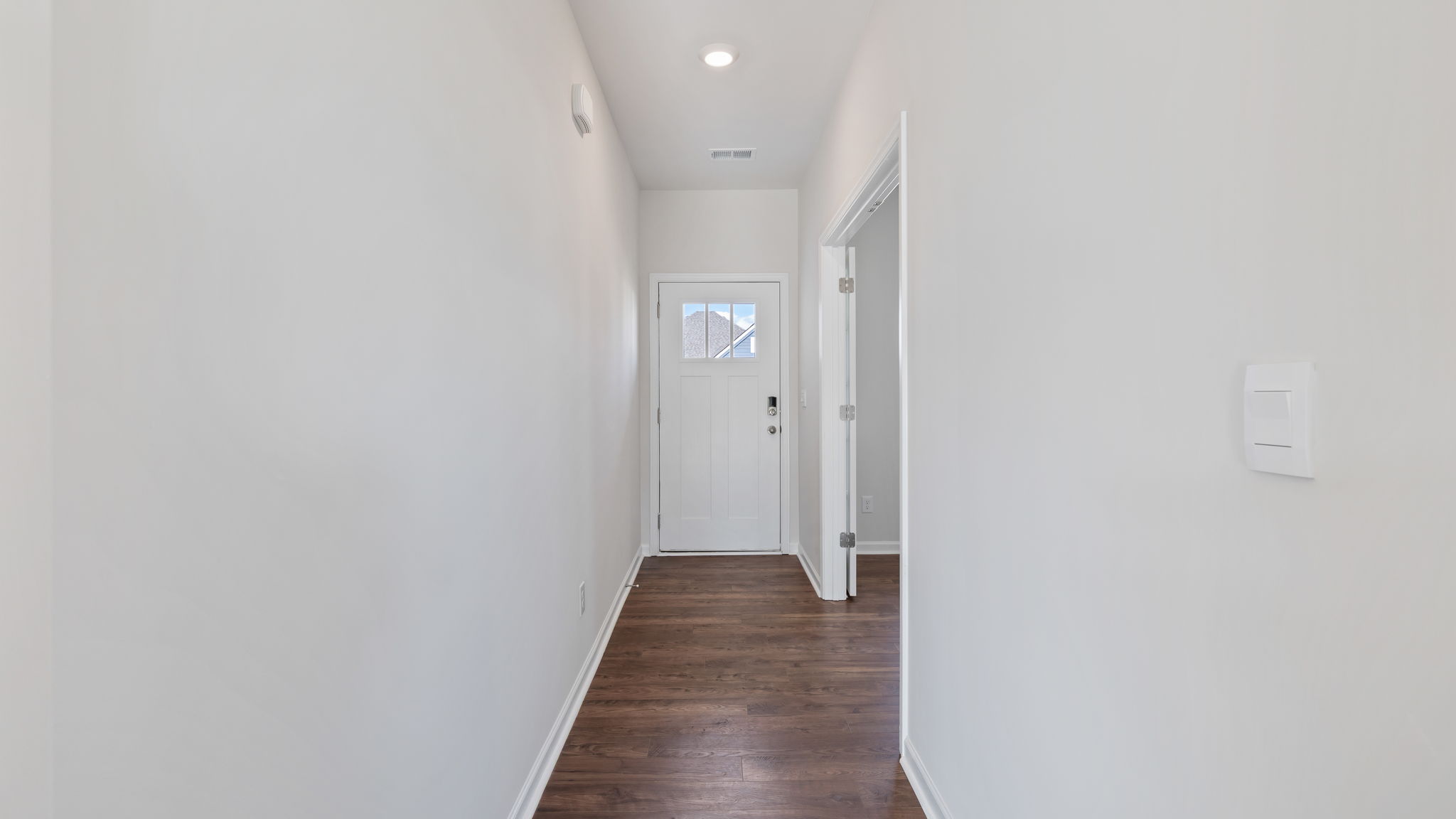 Entry way into home with study.