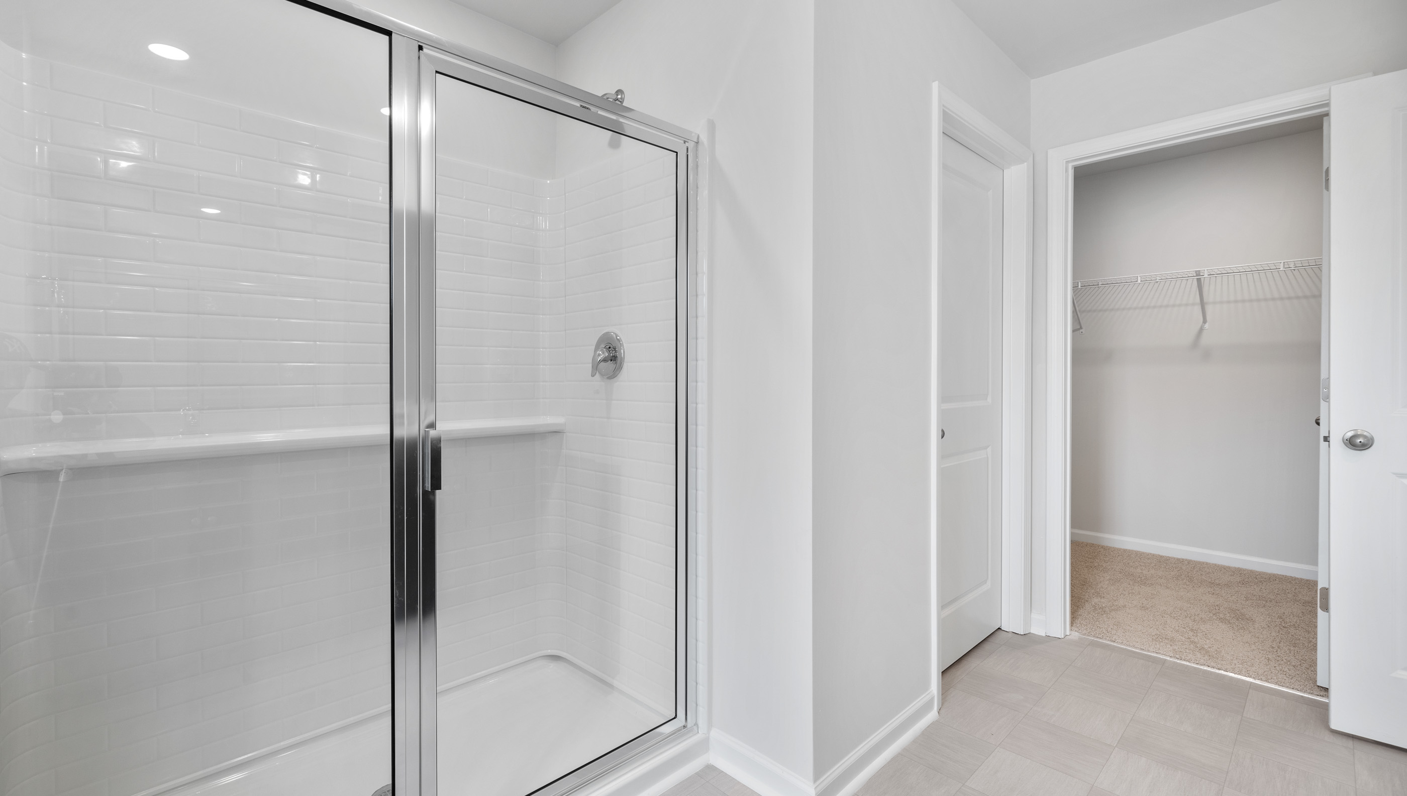 Primary bathroom walk-in shower.