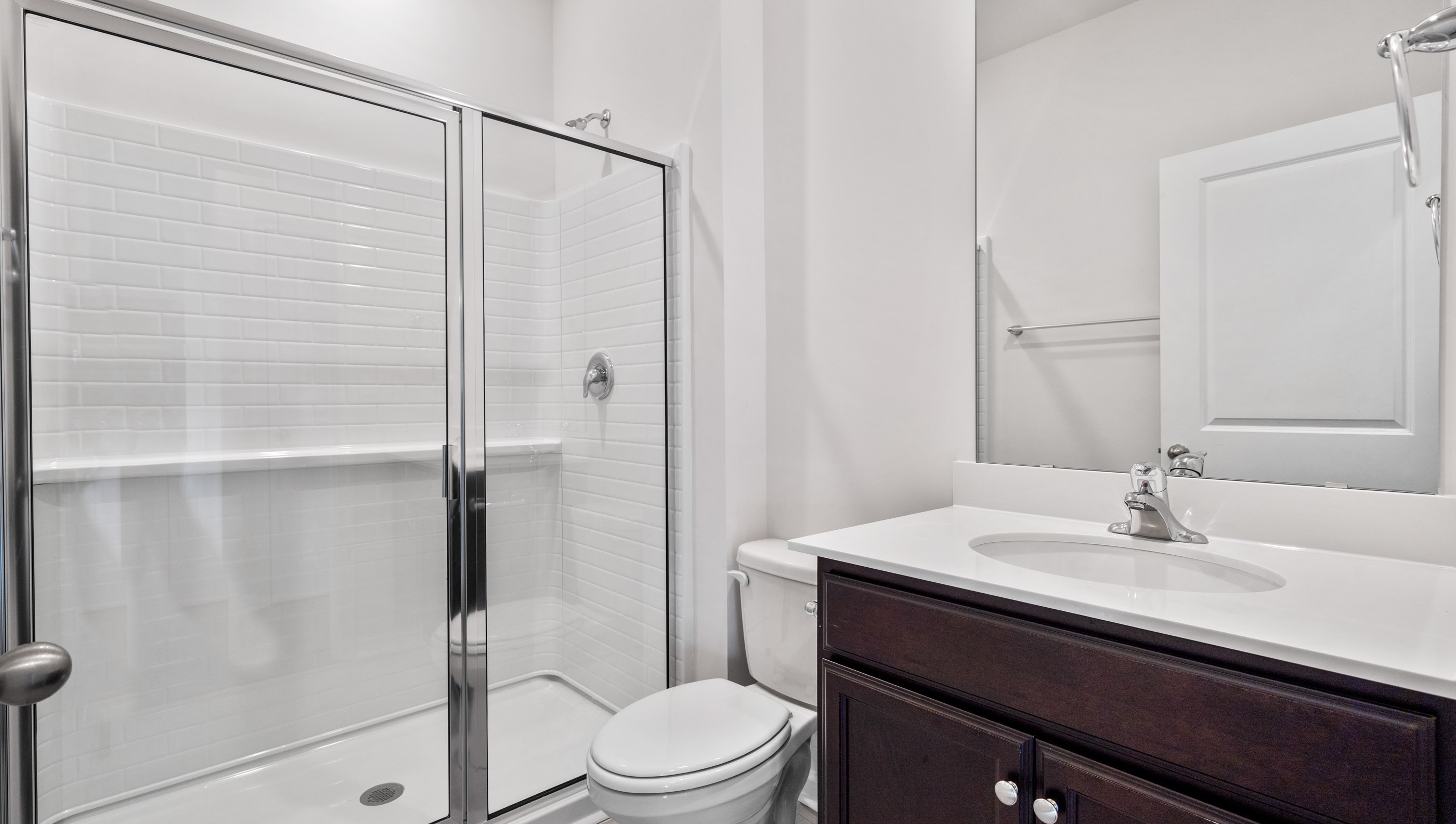 Full bath on the main level with vanity and combination shower / tub.