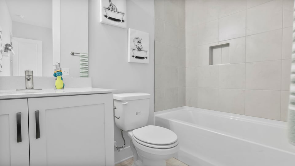 Bathroom with tub and vanity.