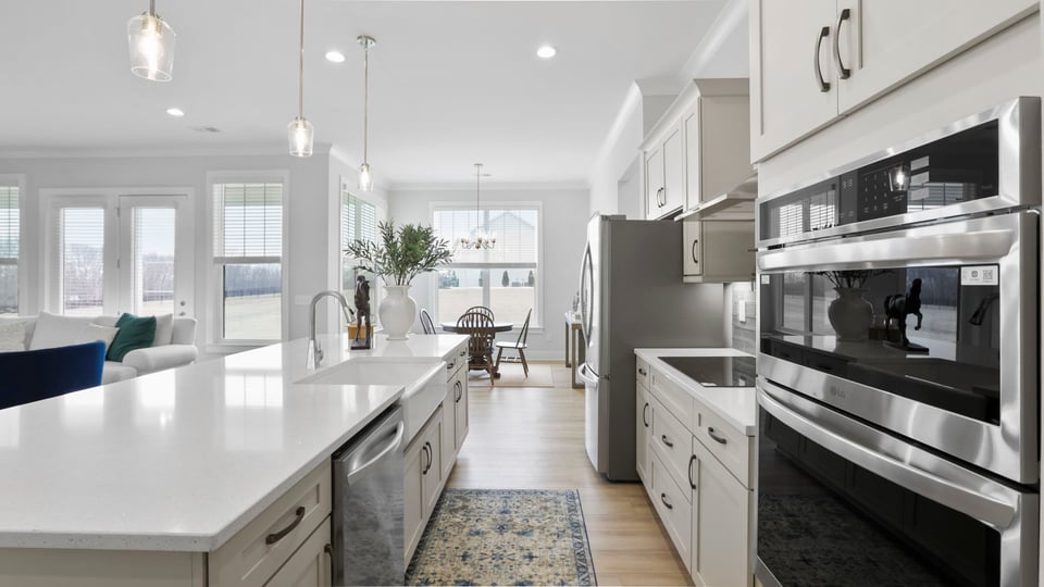 Kitchen with island and cabinetry.