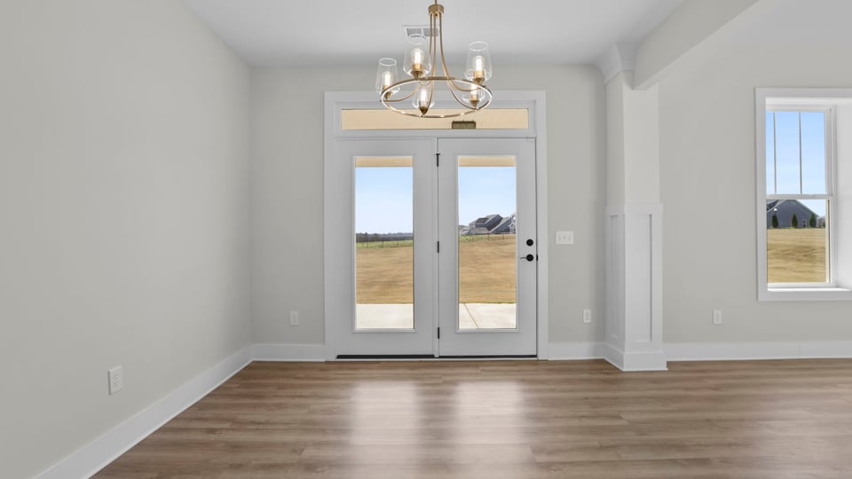 Kitchen and island with granite counter tops.