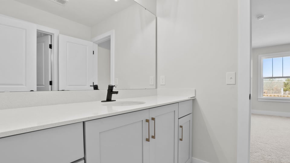 Bathroom with vanity.