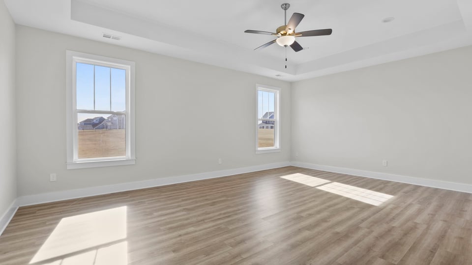 Bedroom with windows.