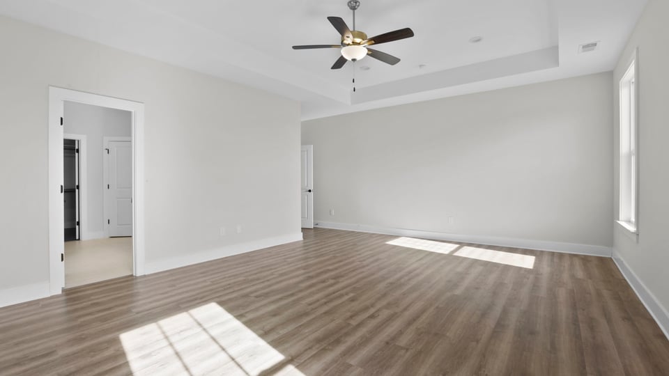Bedroom with windows.