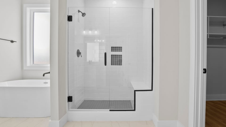 Bathroom with walk in shower.