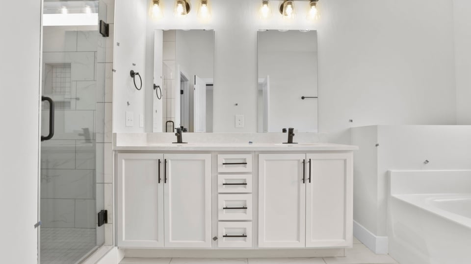 Vanity and walk in shower.