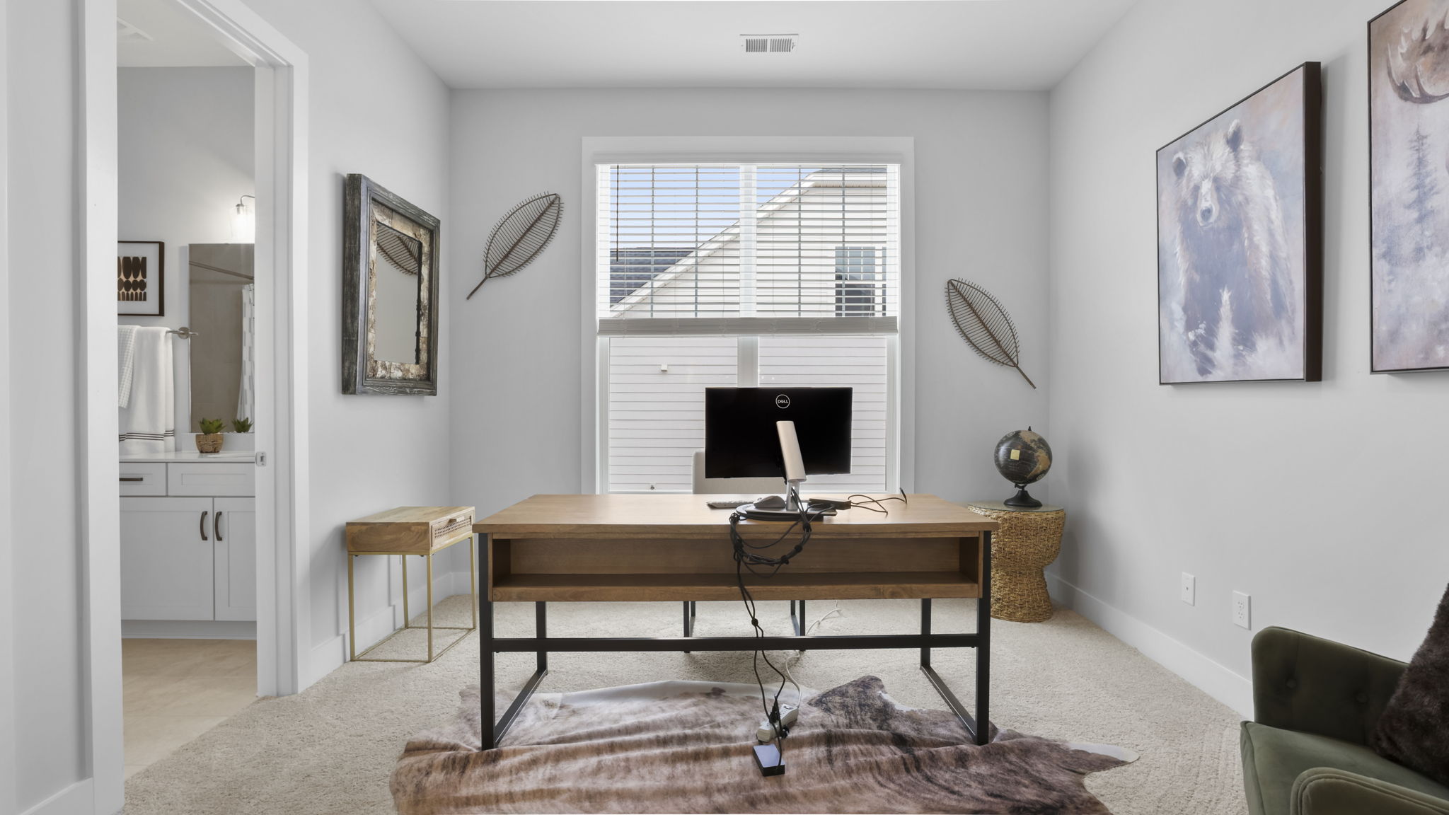 Bedroom with carpet and window.