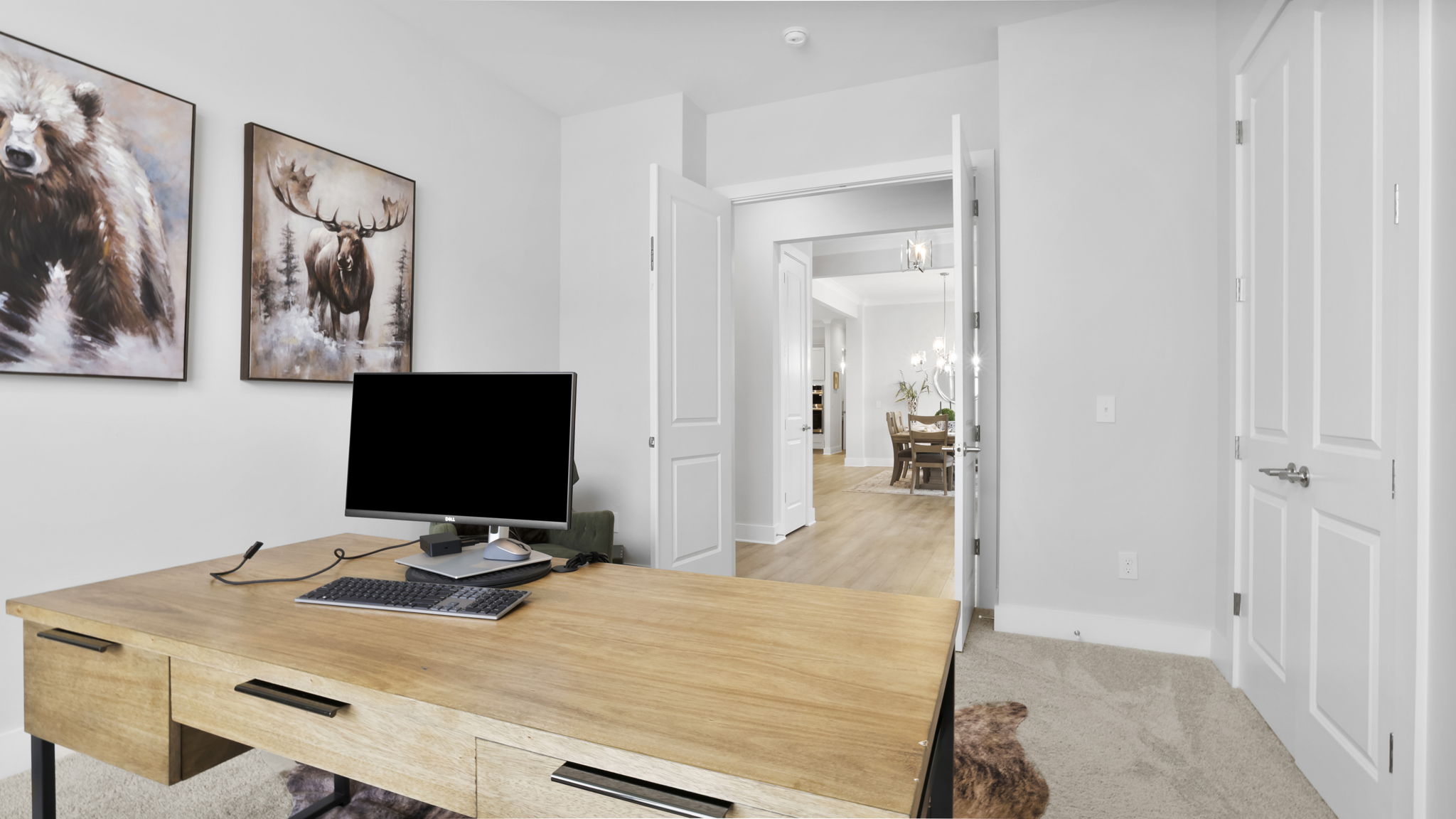 Bedroom with carpet and window.