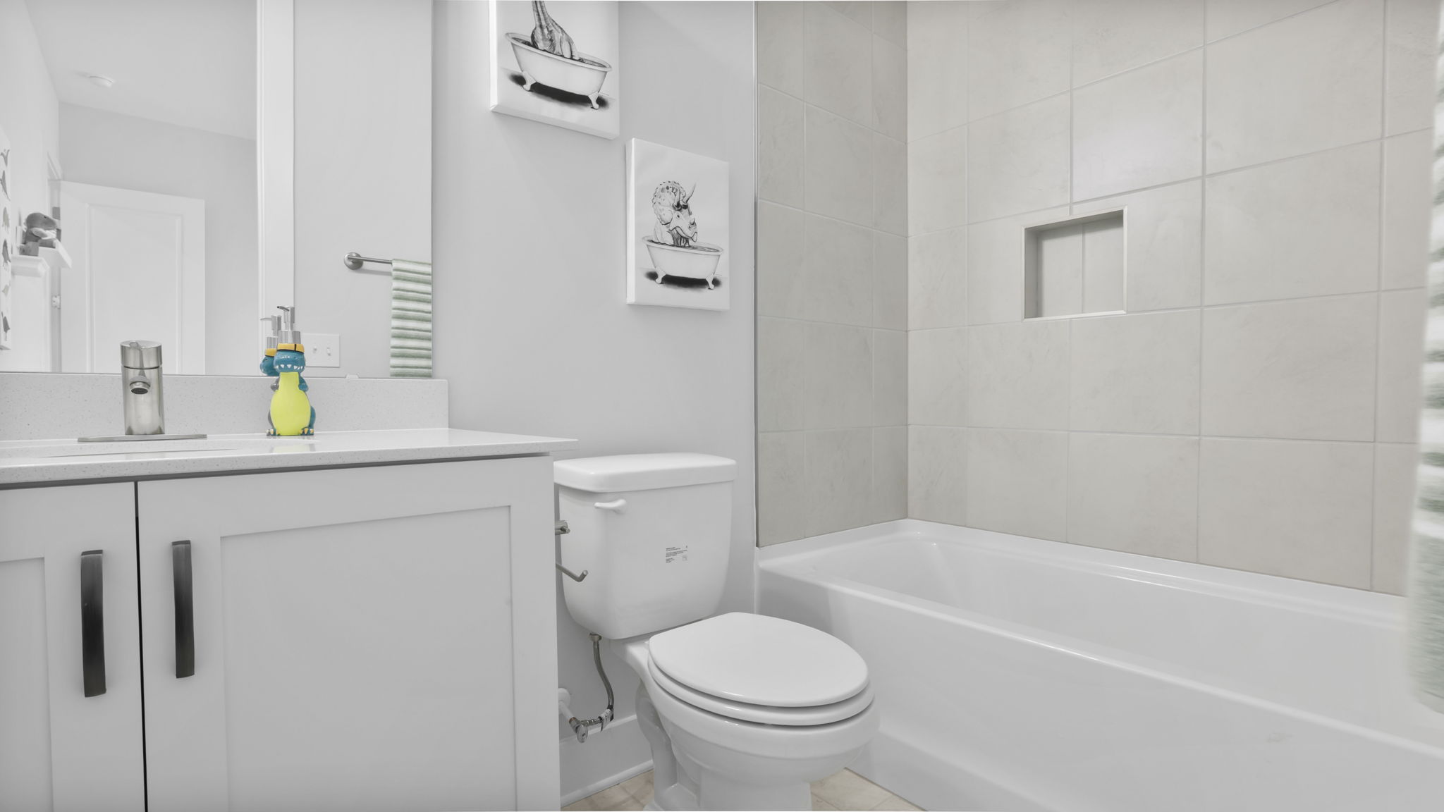 Bathroom with single vanity sink and tub.