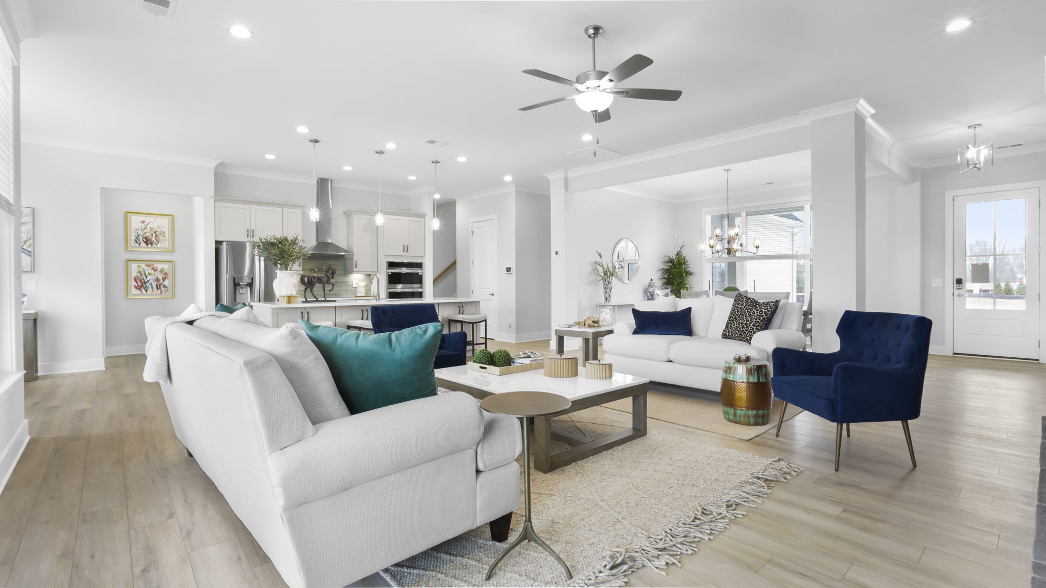 Family room with fireplace and windows.