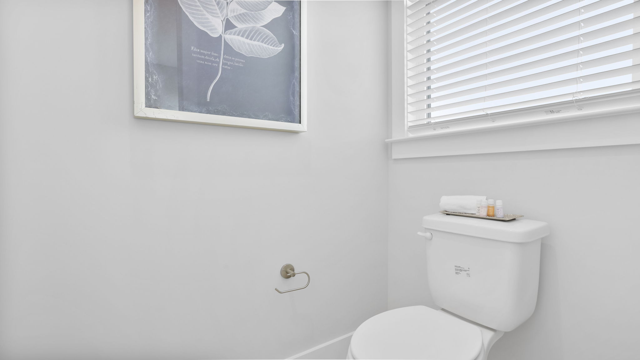 Bathroom with small window.