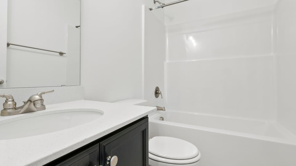 Bathroom with vanity sink.
