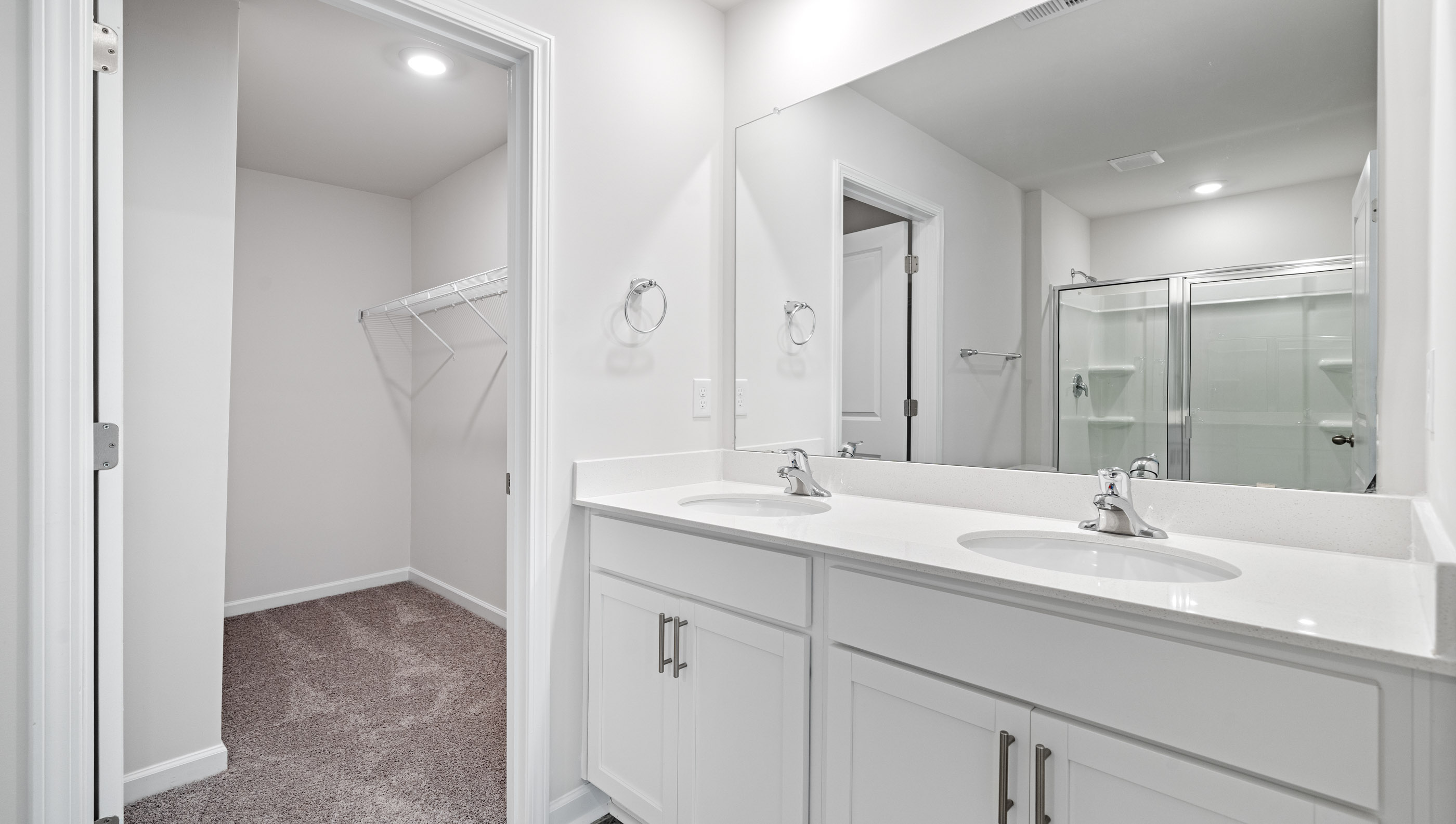 Bathroom with dual vanity.