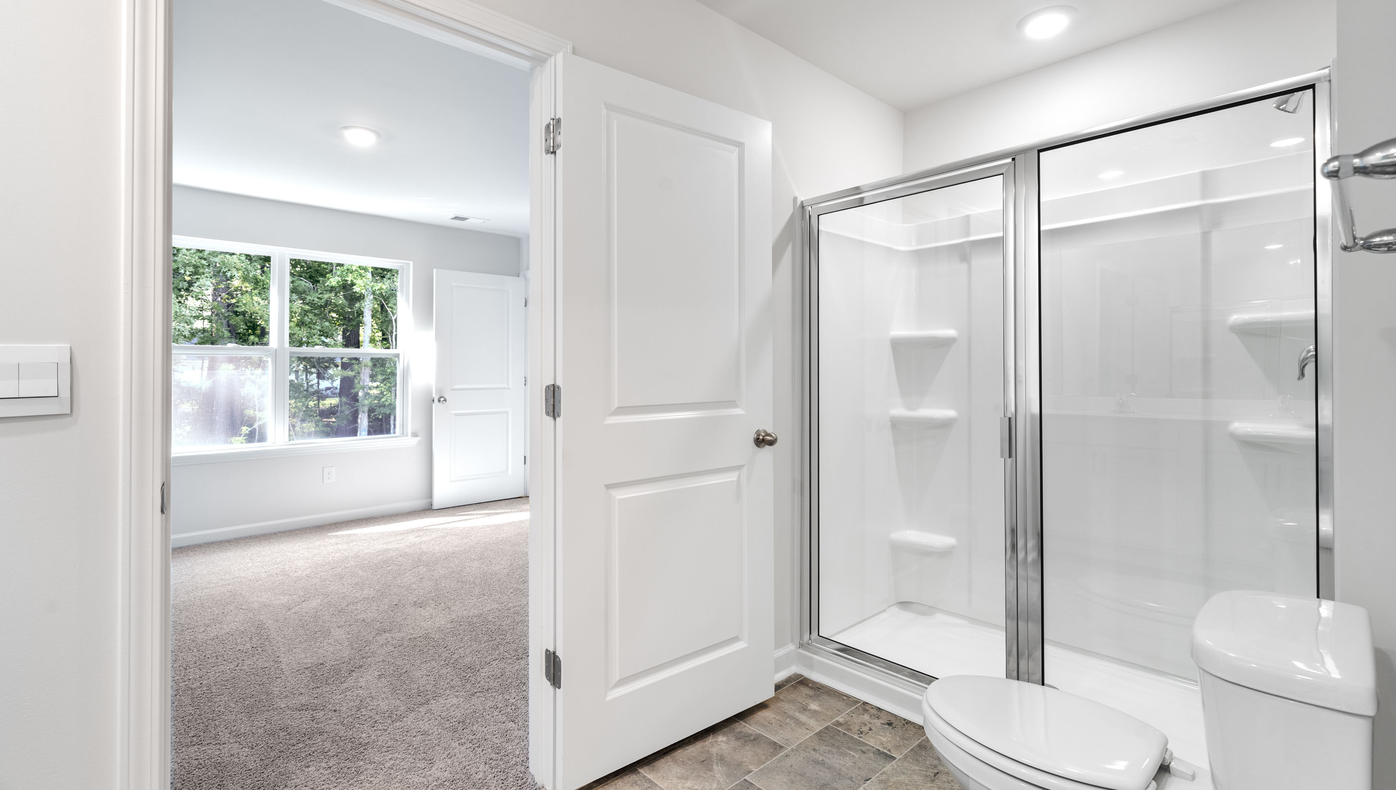 Bathroom with walk in shower.