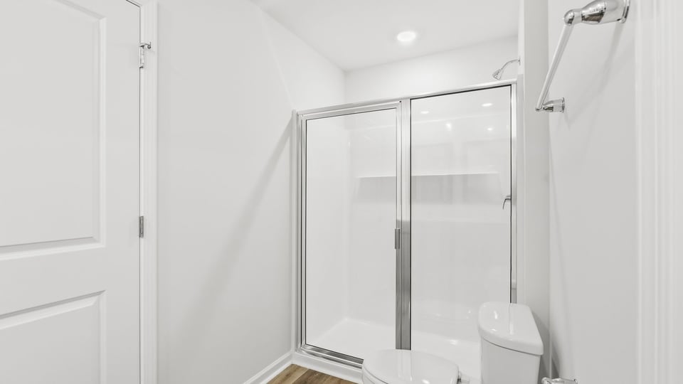Primary bathroom with double vanity sinks.