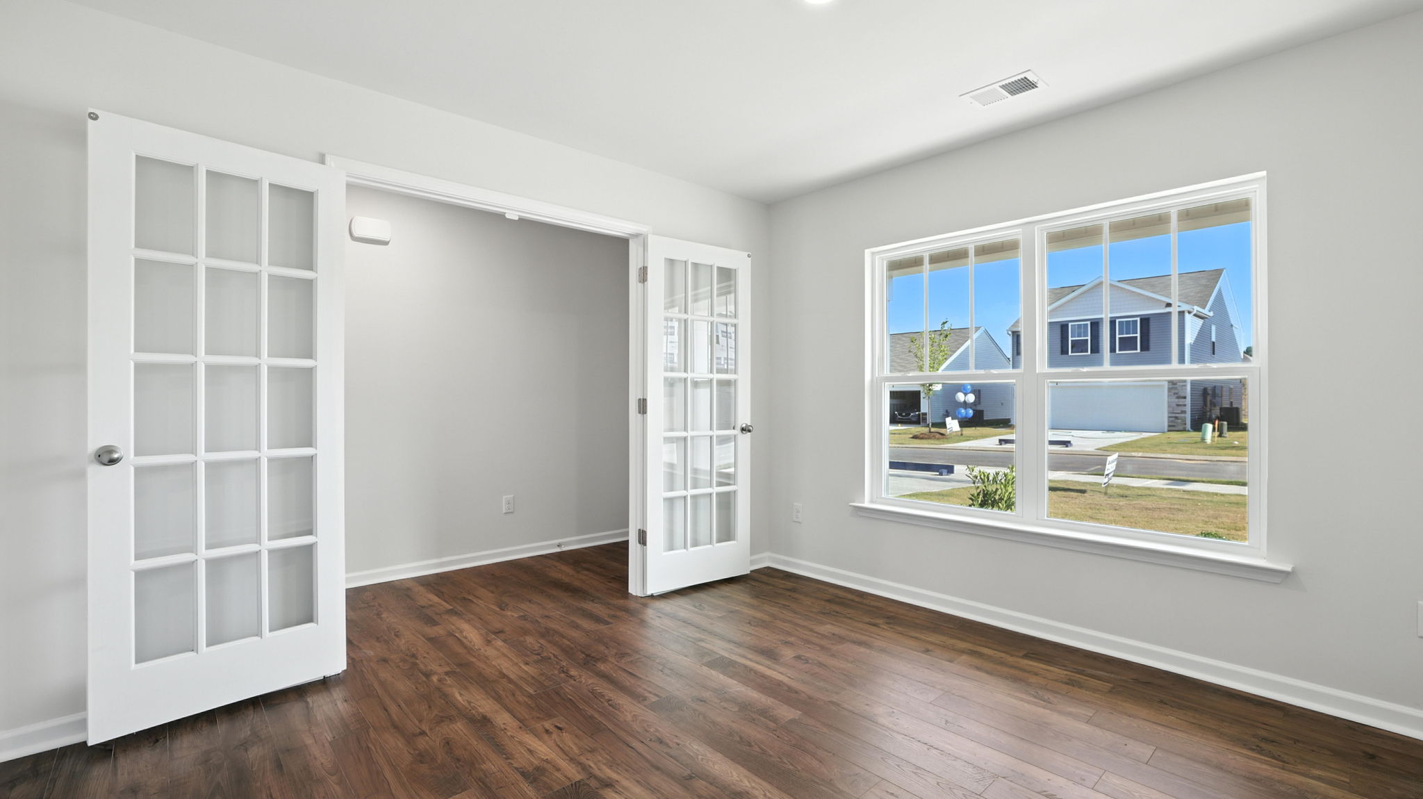 Study with windows and French doors.