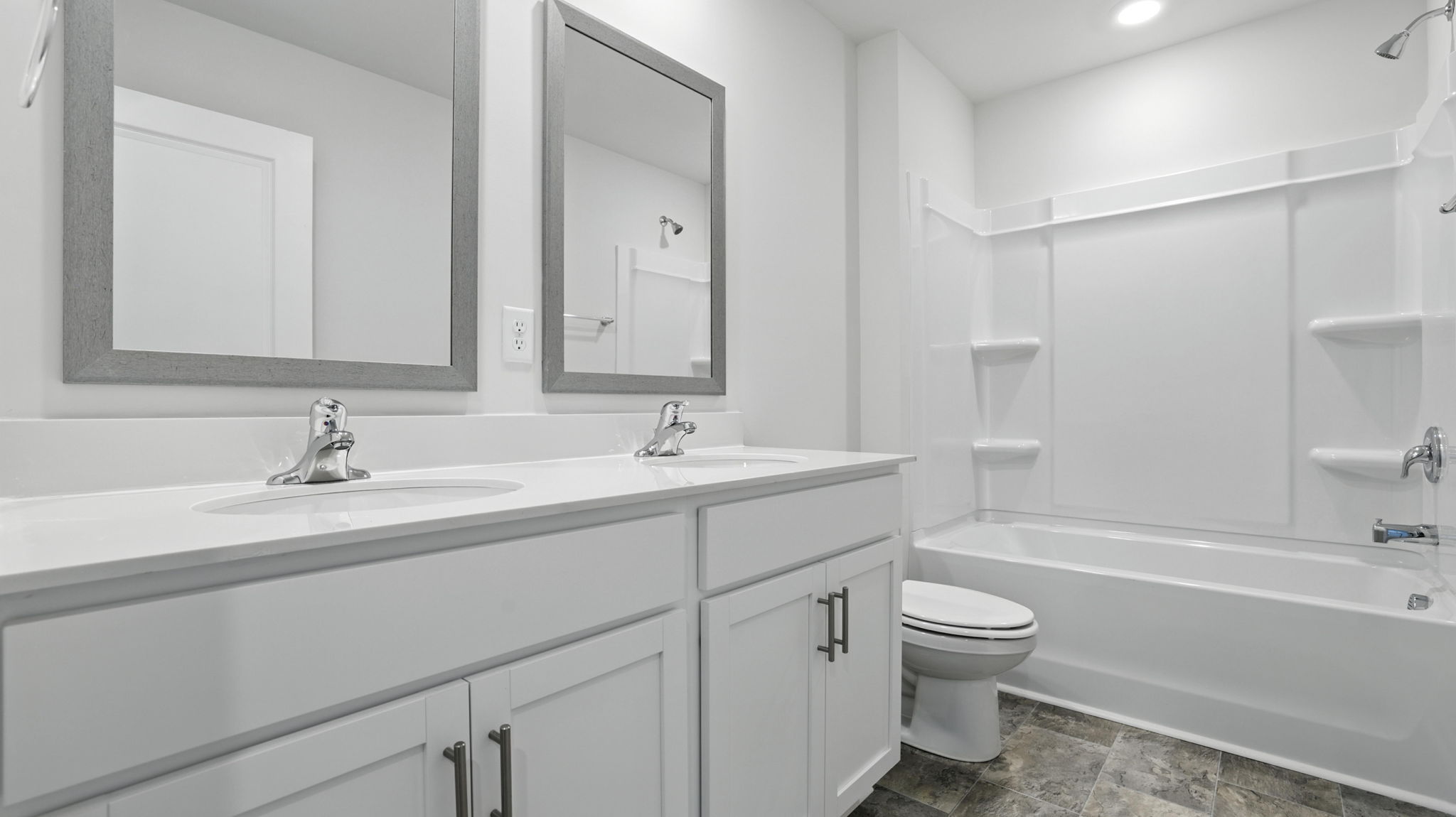 Bathroom with vanity and tub.