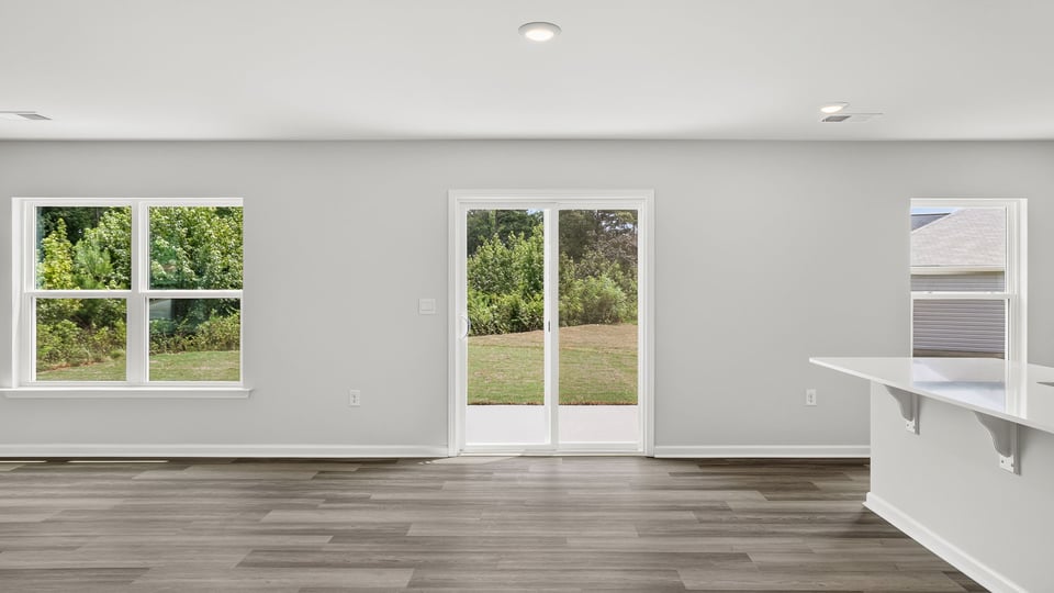 Family room with windows.